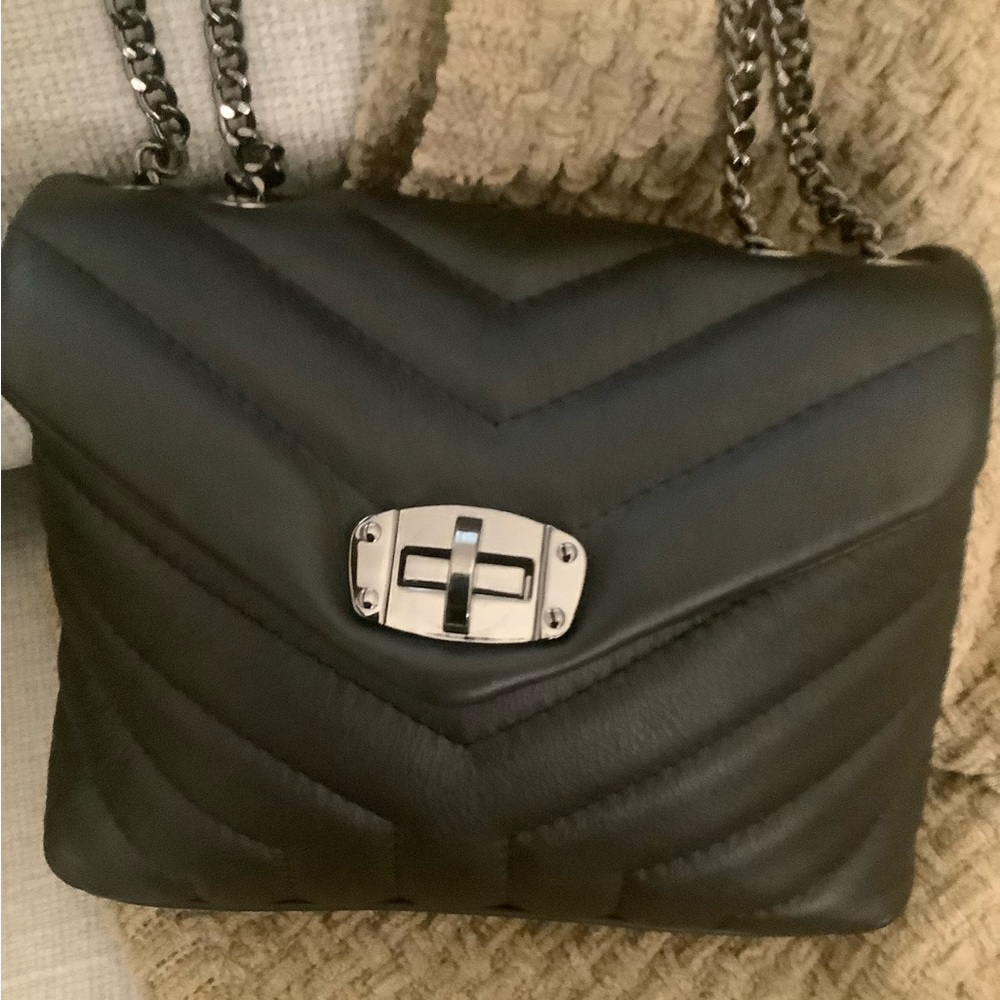 Plush black chevron genuine leather crossbody bag with gun metal hardware